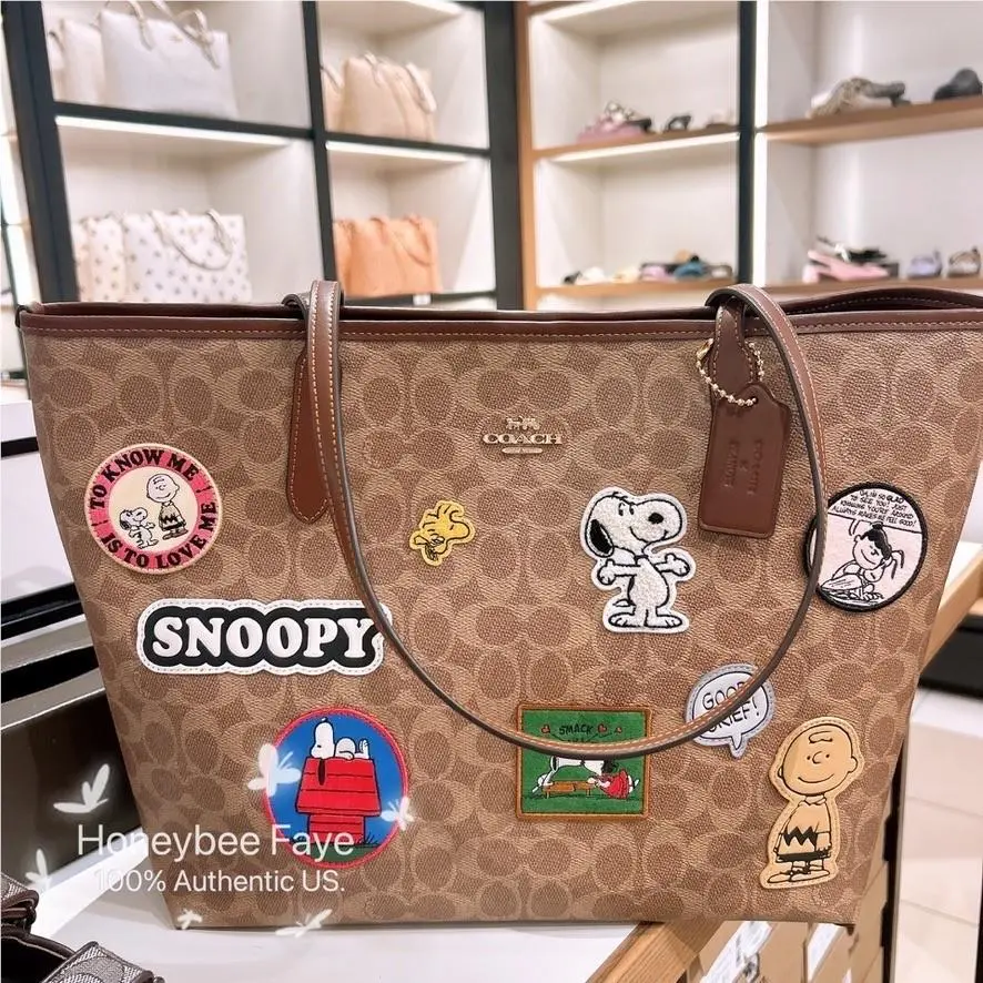 X Peanuts City Tote Bag In Signature Canvas with Snoopy Print/patches CBJ91 Tan/Brown Multi by Coach