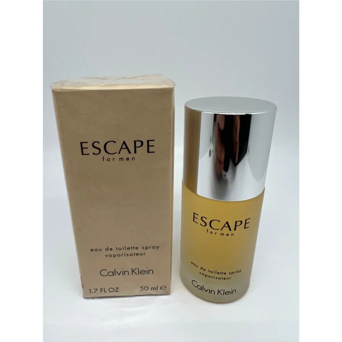 Calvin Klein Escape Men by Unilever Cosmetics 1.7 oz Edt Spray Frosted Glass Bot