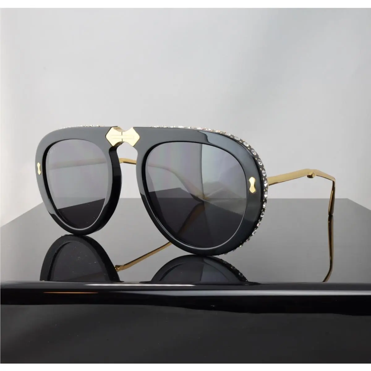 GG0307S Black Foldable Sunglasses Gray Lens with Crystals Gold Frame by Gucci
