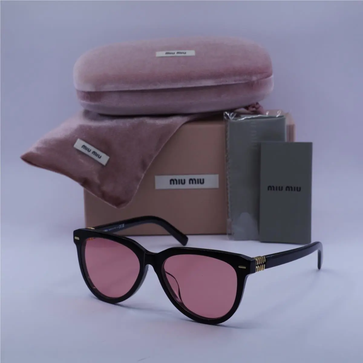 Miu Miu MU12ZSF 16K1D0 Black/red 56-16-140 Sunglasses