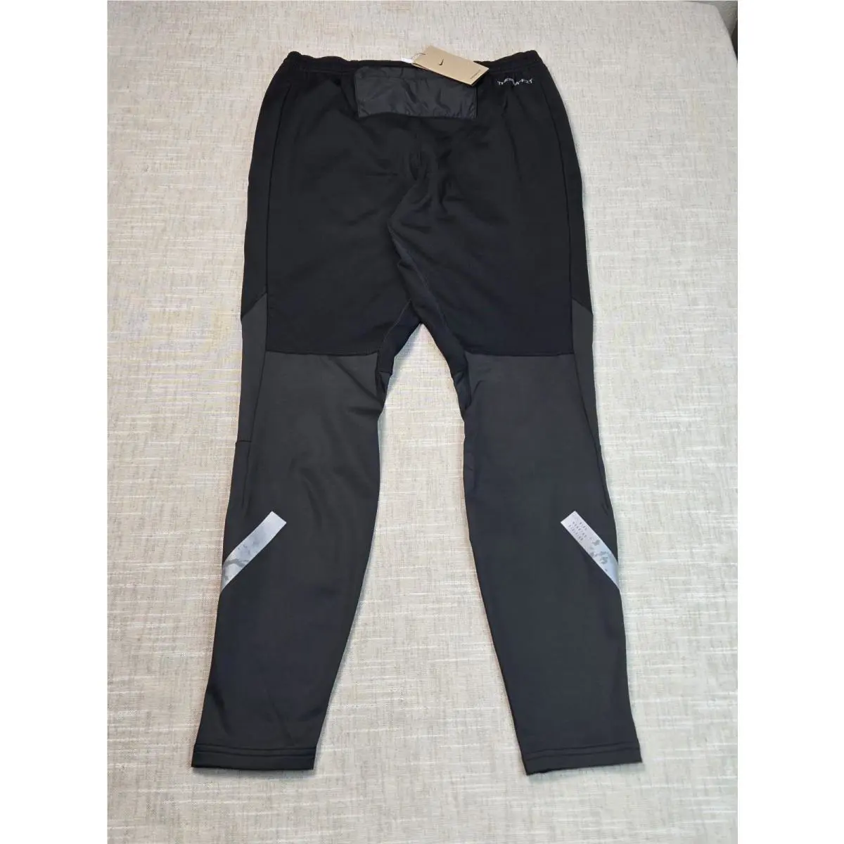 Nike clothing - NIKE Run Division Elite Running Pants Therma-FIT - DV9274-010 - Black Silver 1