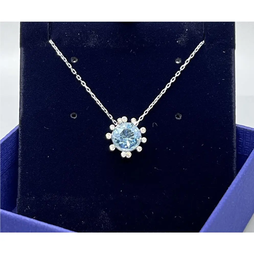 Beautiful Swarovski Crystal 5479930 Round Aqua Starburst Pendant