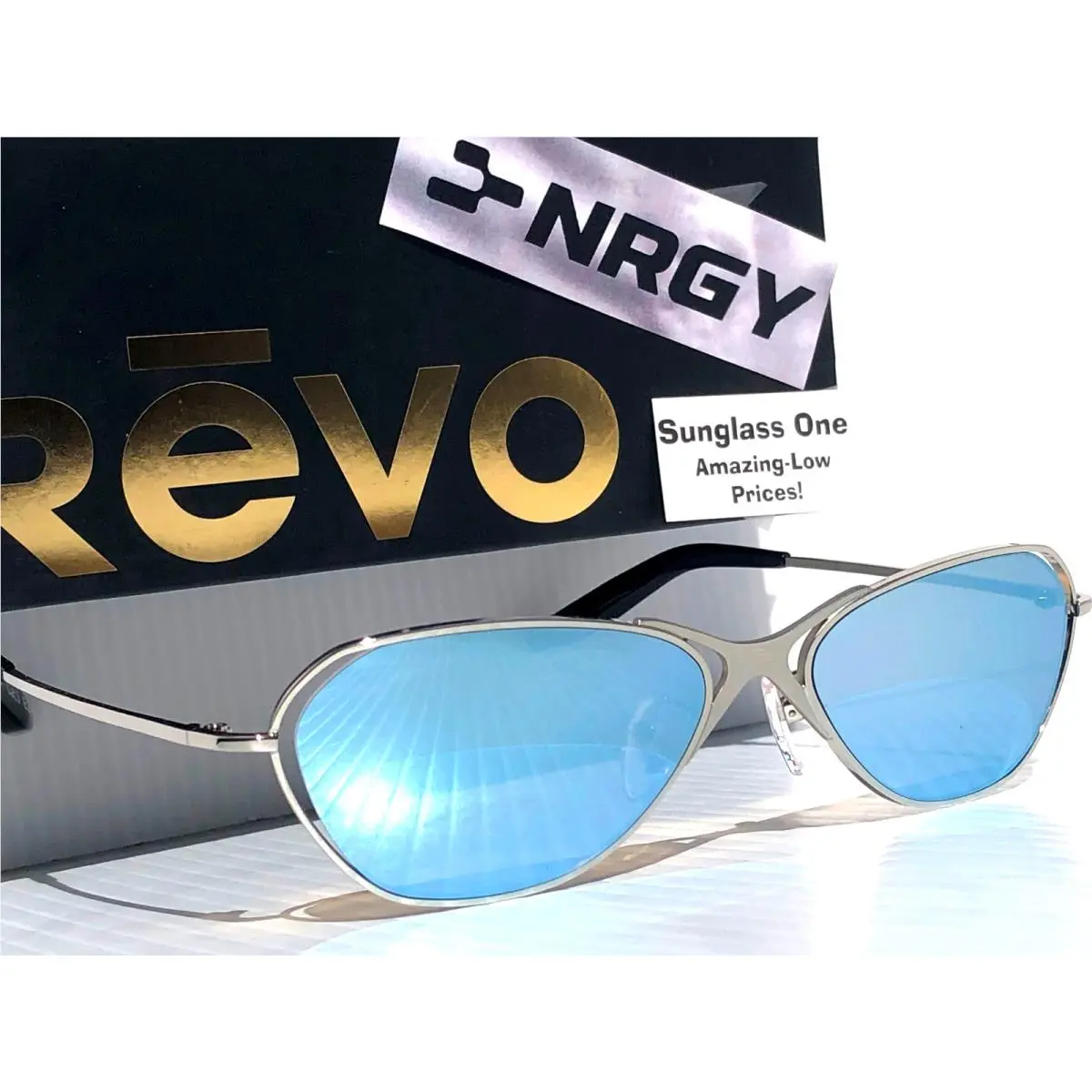 J Balvin  Nrgy Loop Shiny Chrome Polarized Blue Lens Sunglass 6006 03 BL by Revo