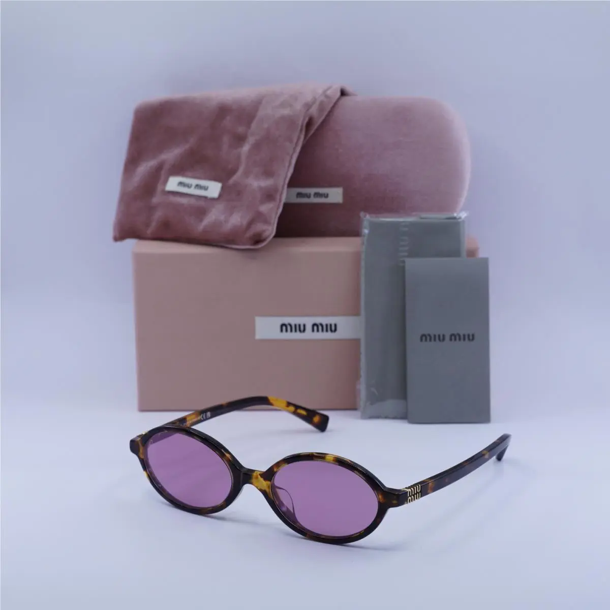 Miu Miu MU04ZSF VAU50D Honey Havana/dark Pink Mirror Silver Internal