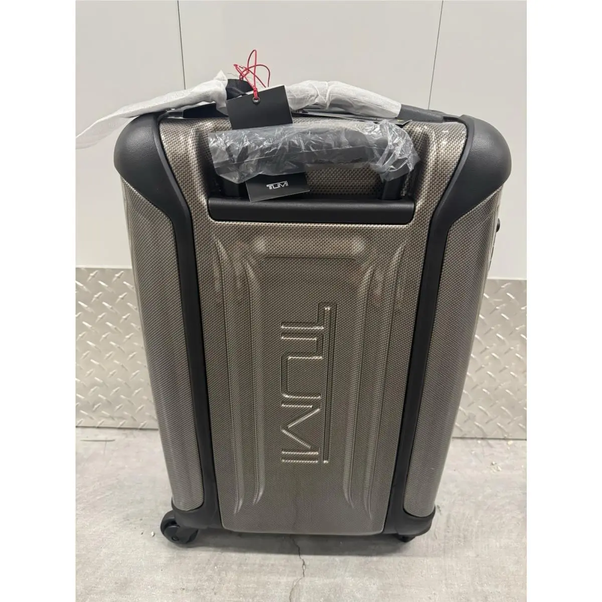Vapor International 4 Wheel Carry-on Hard Shell Case Spinner 22 Champagne by Tumi