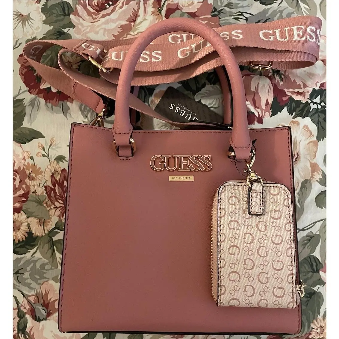 Guess Women`s Tremblay Crossbody Satchel with Guitar Strap Blush Pink