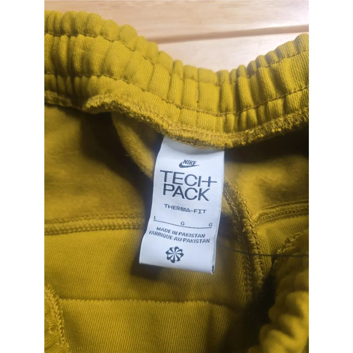 Nike clothing - Nike Sportswear Therma-Fit Tech Pack Pants - FB7823-716 - Yellow (UPC: 196969378875) 8