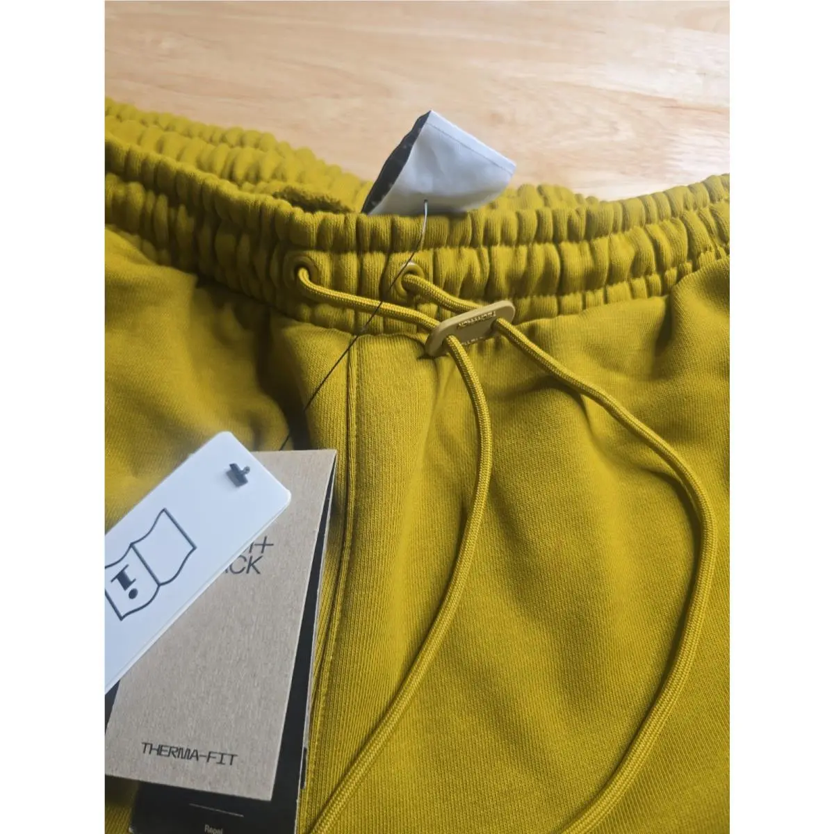 Nike clothing - Nike Sportswear Therma-Fit Tech Pack Pants - FB7823-716 - Yellow (UPC: 196969378875) 3