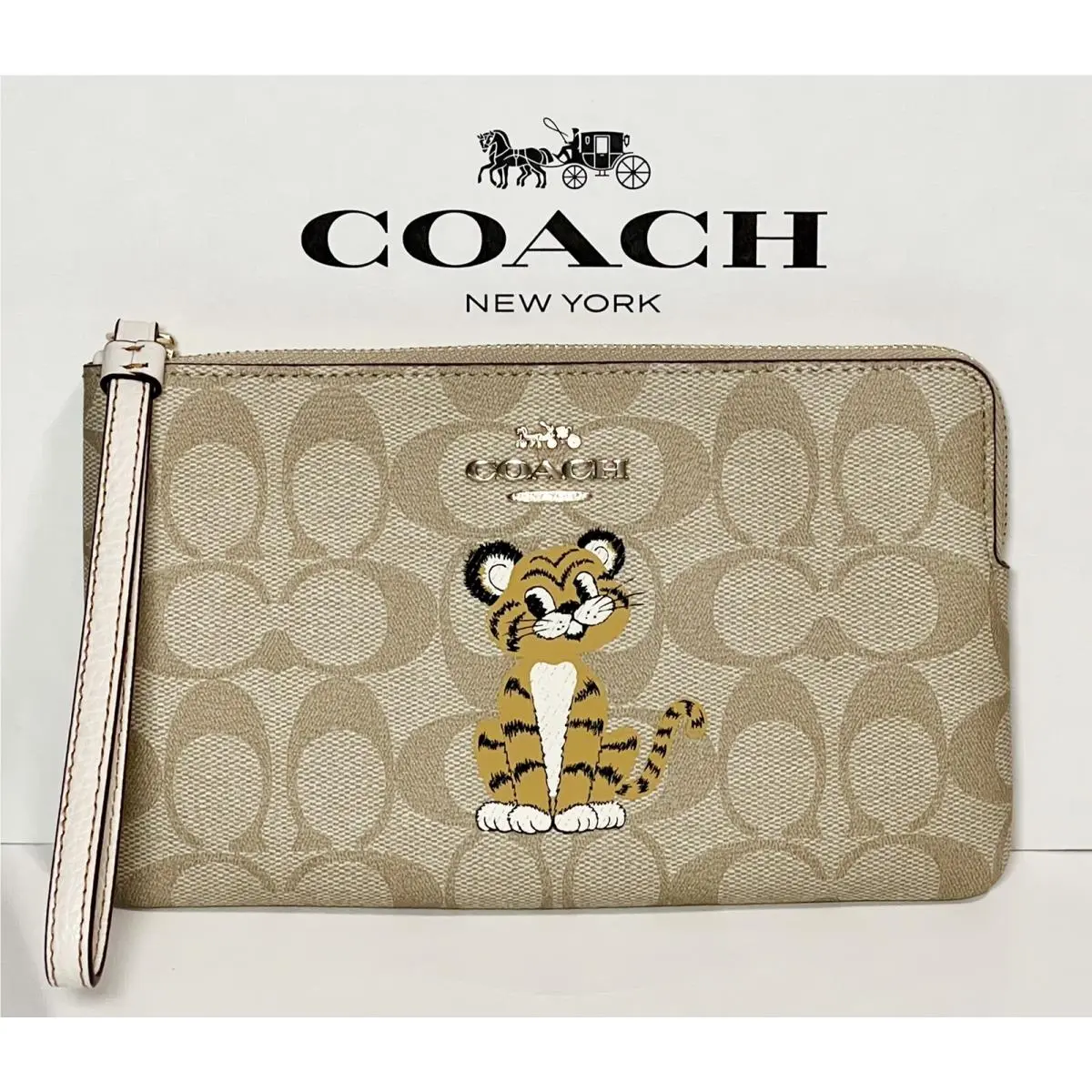 Coach ﻿large Corner Zip Wristlet in Signature Tiger Lunar Year C7698