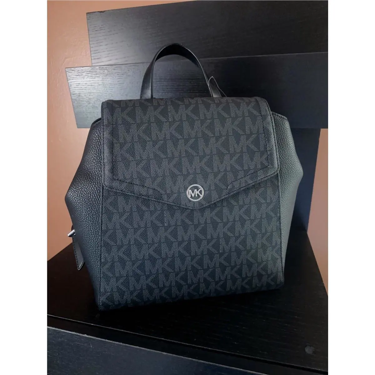 Michael Kors MD Black Pebbled Leather Backpack Logo Covered Freya