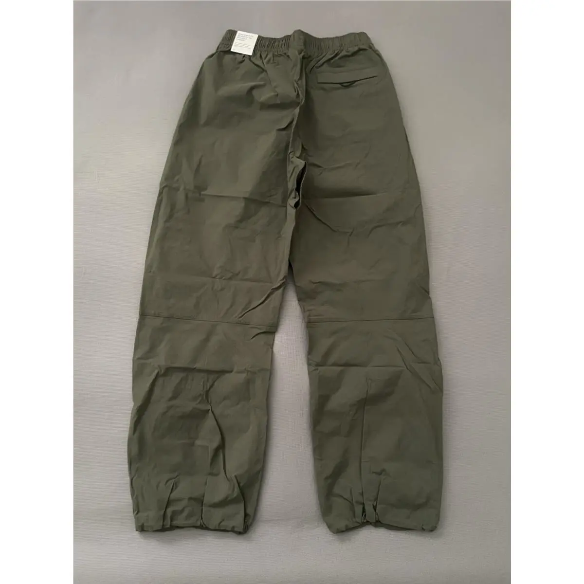 Nike clothing - Nike Tech Woven Oversized Pants - HM7158-356 - Sequoia (UPC: 197859985494) 1
