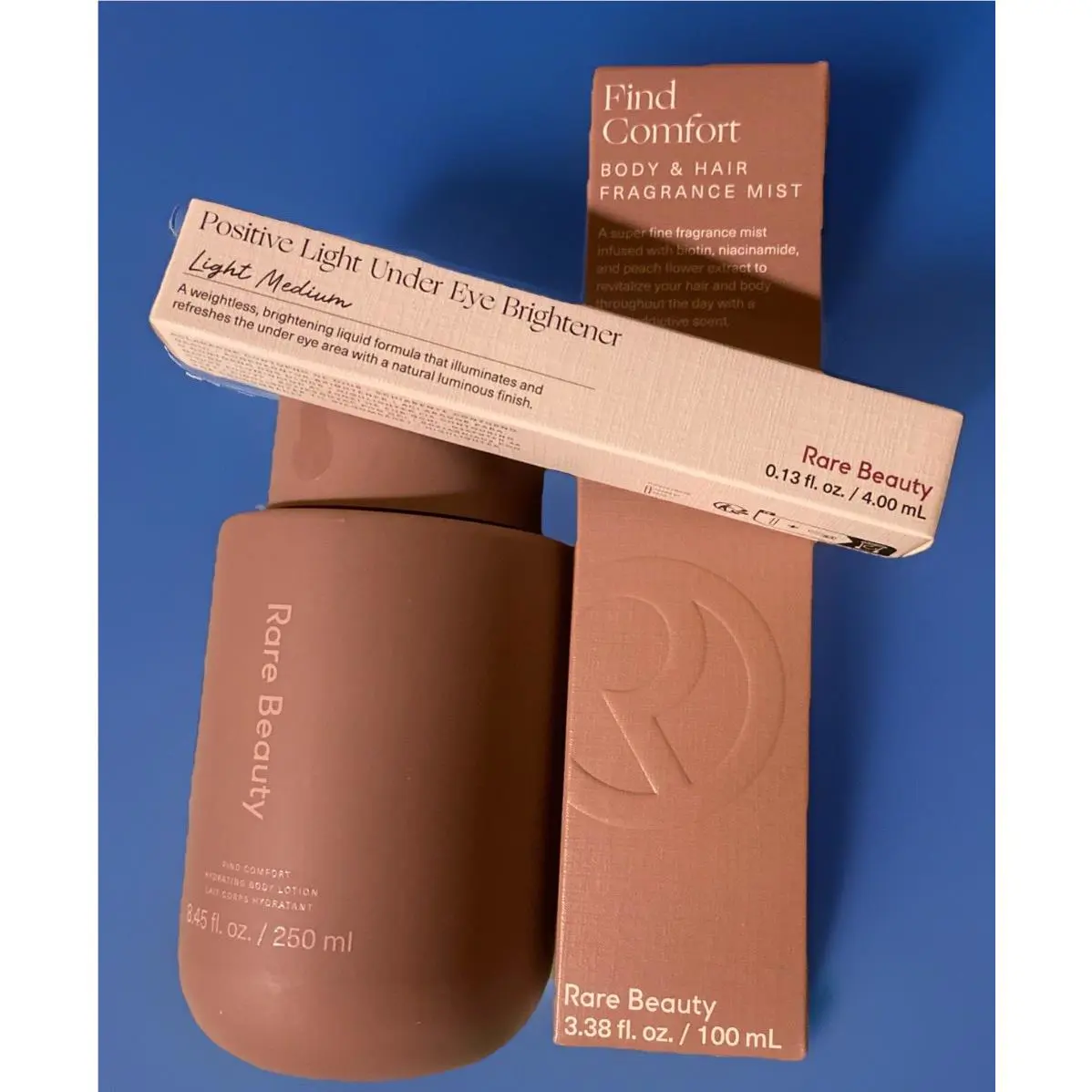 Beauty Bundle Findcomfort Lotion Hair+bodymist Undereyebrighter Lt Med by Rare Beauty