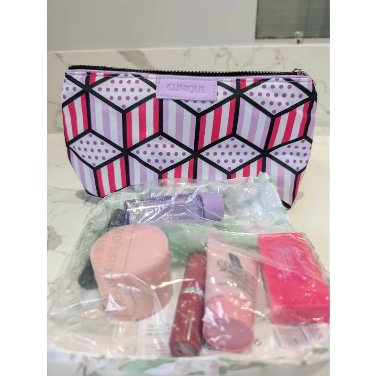Clinique Assorted Travel Size Products with Travel Cosmetic Bag - Read Desc