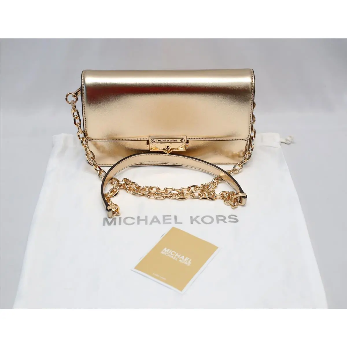 Michael Kors Cece Gold Shoulder Crossbody Clutch Bag. Price On The Tag