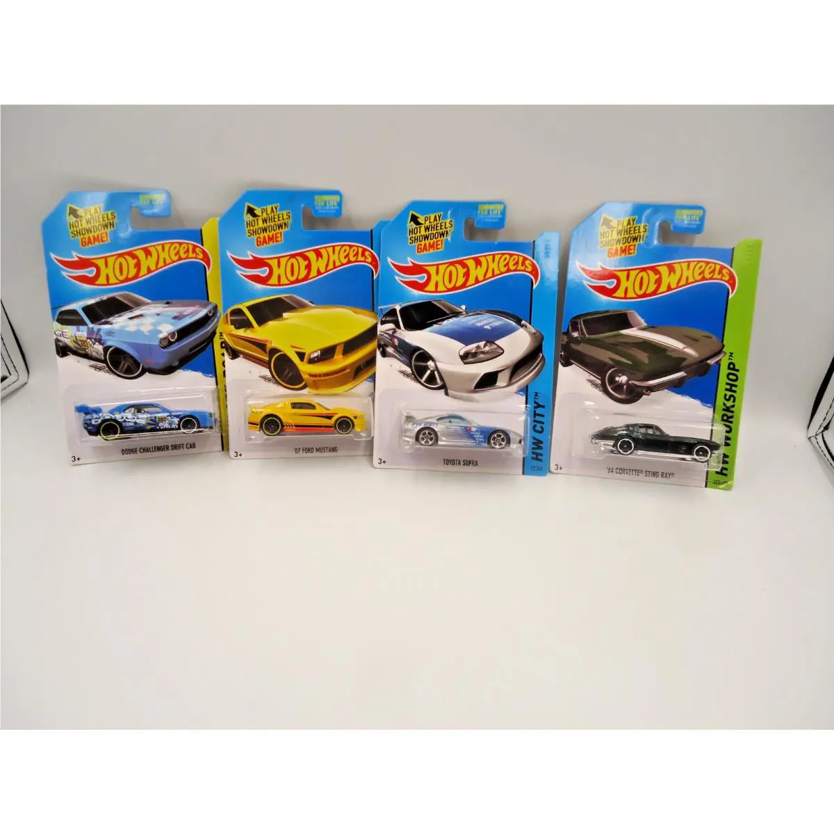 Hot Wheels Kmart Excl 11/2014 4 Cars -supra `07 Mustang Challenger `64 Stingray