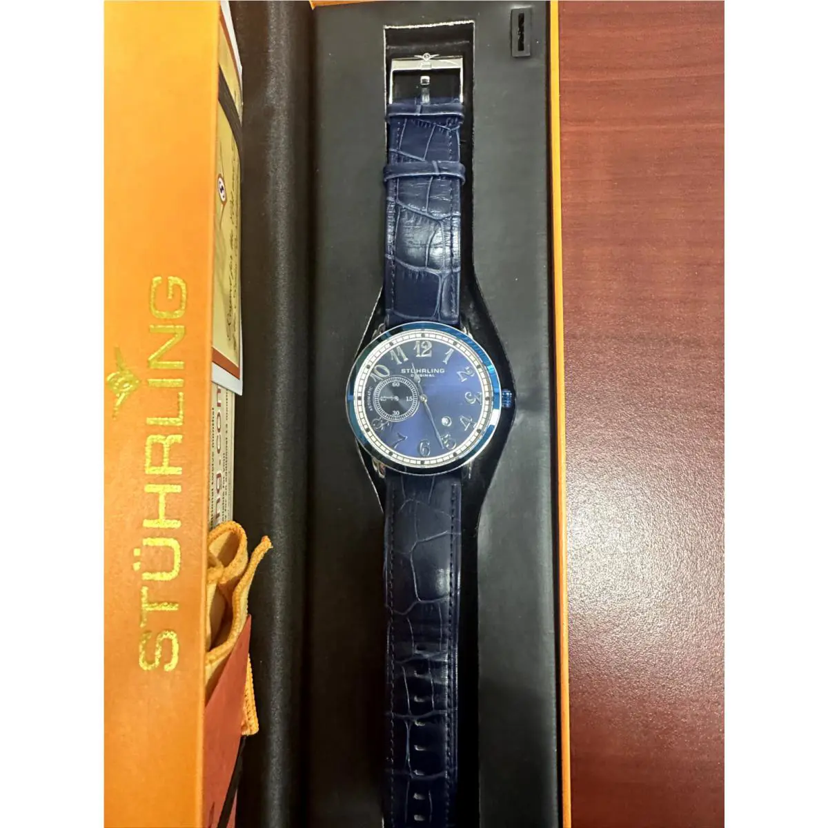Men`s Stührling Automatic Blue Face Skeleton Watch /papers