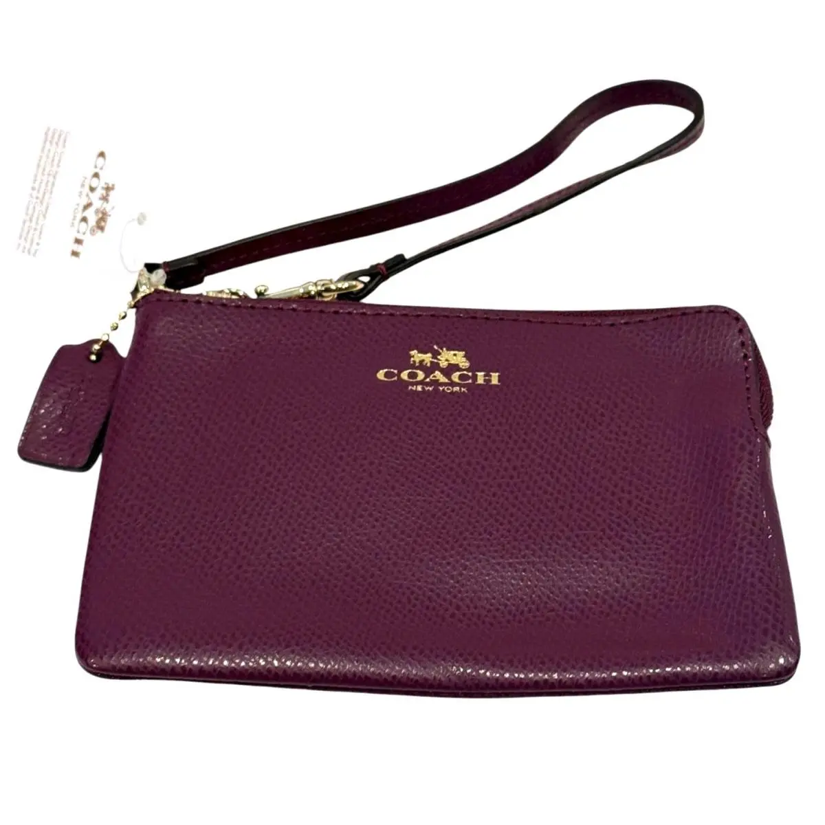 Coach Women`s Plum Pebble Leather Wristlet Bag Gold Logo Strap Zip Tag