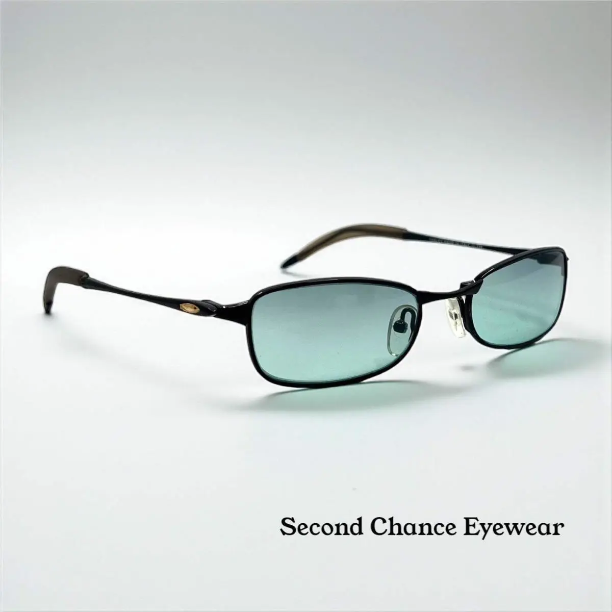 Straightline 2.0 Vintage-model 11-729 Solid Green Tinted Lenses by Oakley