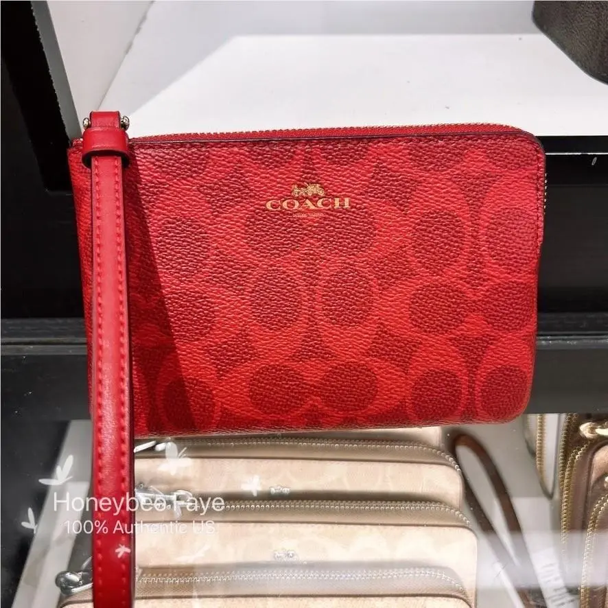 Coach Corner Zip Wristlet In Signature Canvas CAQ75