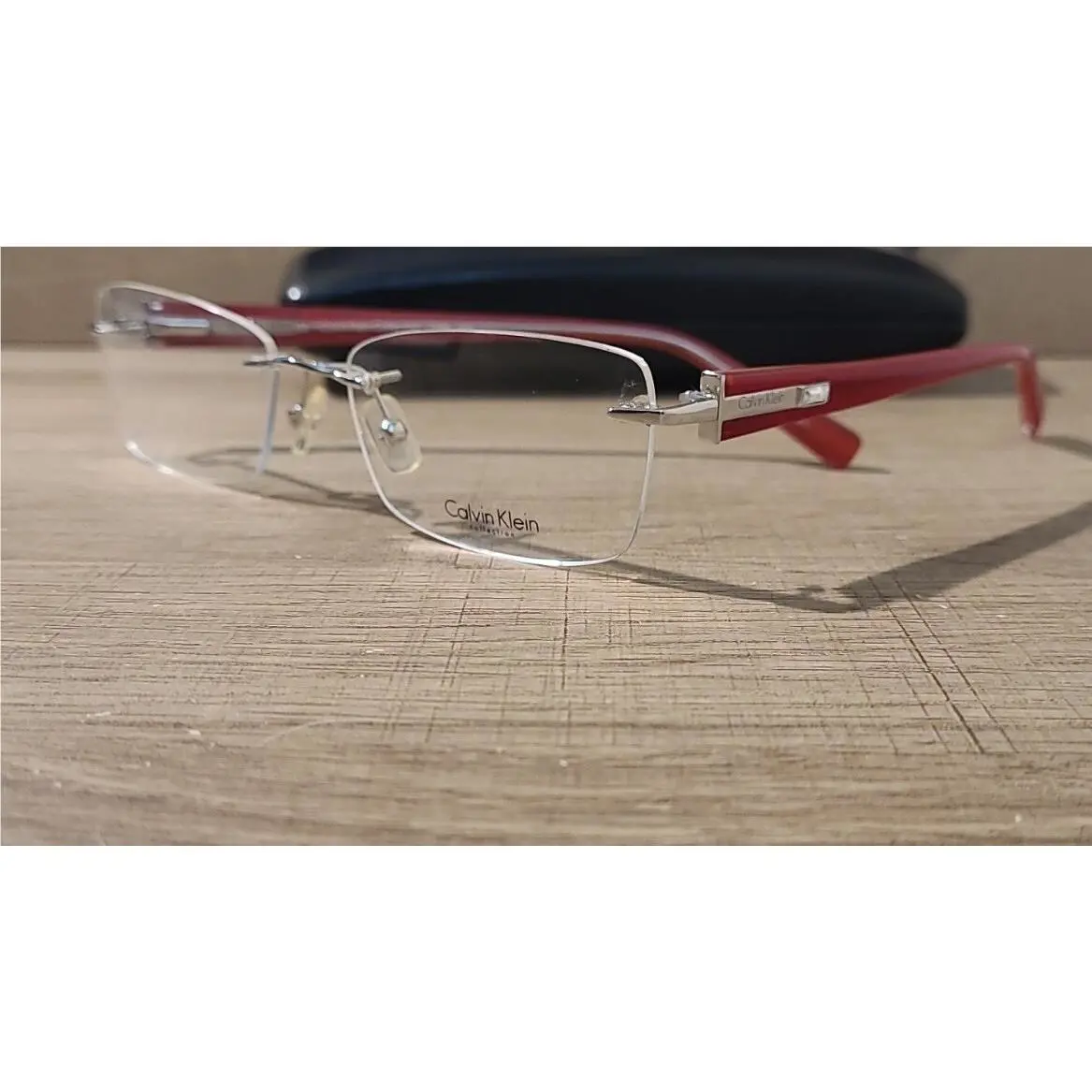 Calvin Klein Collection 7206 615 Red Rimless Eyeglasses Frames w. Gem 53-18-135