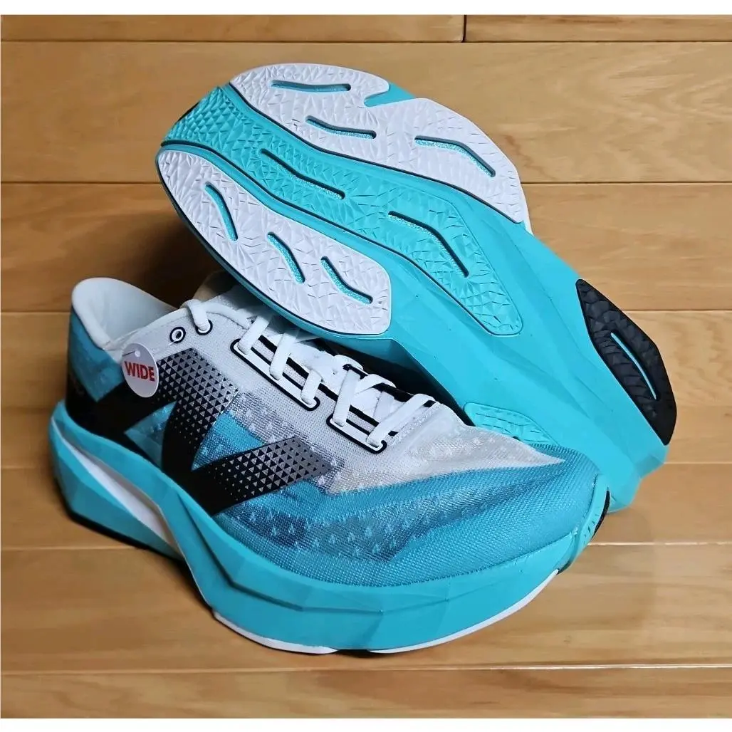 New Balance shoes - New Balance FuelCell Rebel v4 - WFCXCJ4 - Blue, Manufacturer: Cyber Jade/Black/White (UPC: 197966442729) 1