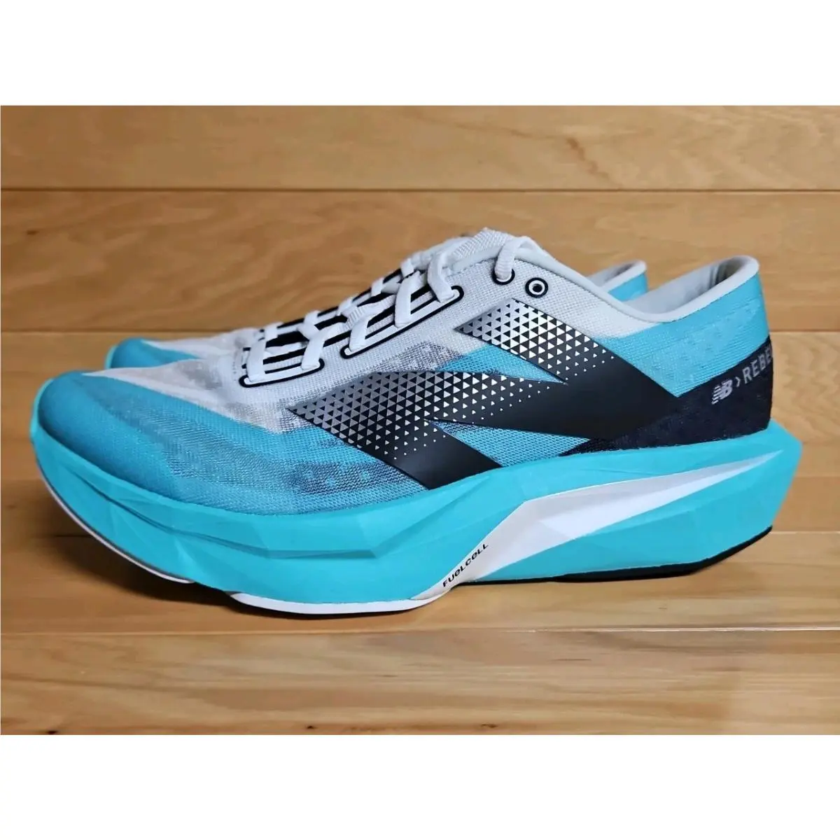 New Balance shoes - New Balance FuelCell Rebel v4 - WFCXCJ4 - Blue, Manufacturer: Cyber Jade/Black/White (UPC: 197966442729) 4