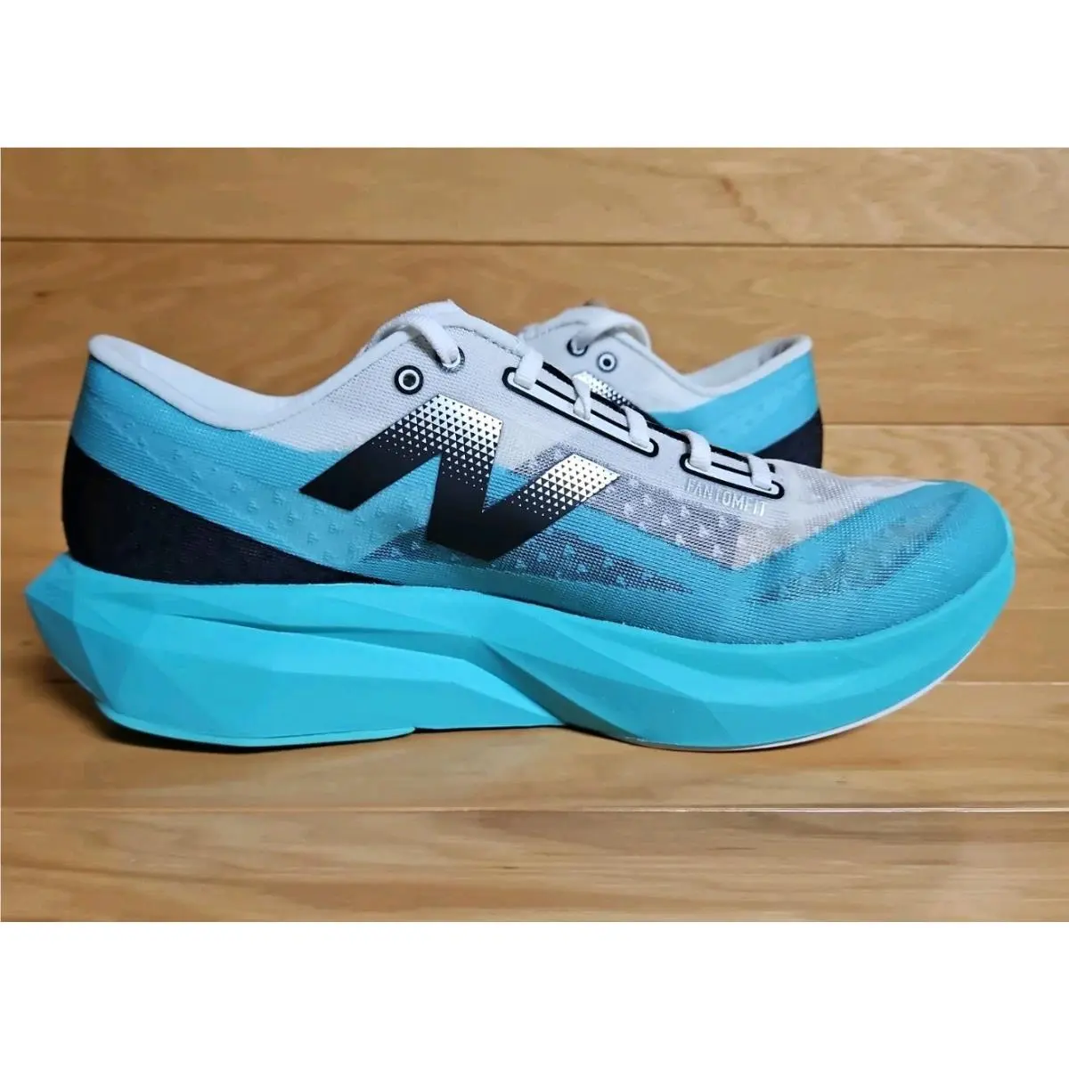 New Balance shoes - New Balance FuelCell Rebel v4 - WFCXCJ4 - Blue, Manufacturer: Cyber Jade/Black/White (UPC: 197966442729) 5