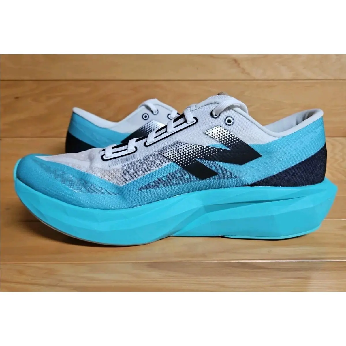 New Balance shoes - New Balance FuelCell Rebel v4 - WFCXCJ4 - Blue, Manufacturer: Cyber Jade/Black/White (UPC: 197966442729) 6