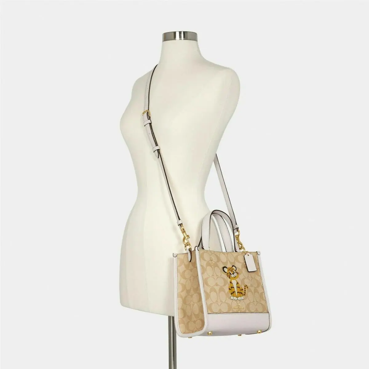 Dempsey Tote 22 Tiger Bag with Dust Bag or Bag + Zip Wristlet Set Options Tiger Bag IM/Light Khaki Chalk Dempsey 22 x-body by Coach