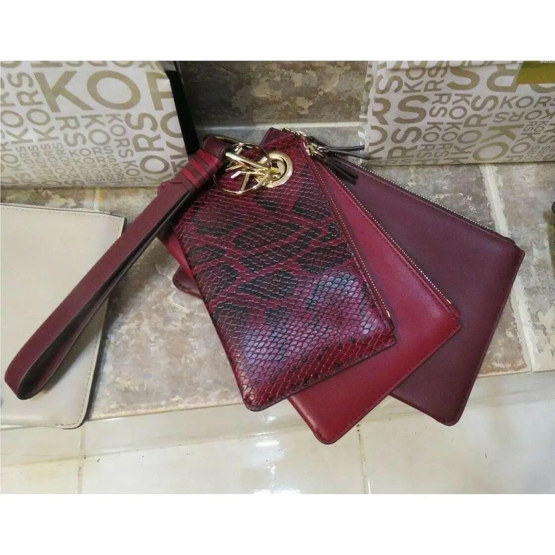 Wristlet/clutch Set: 3 Sizes + Charm + Ring + Strap Interchangeable burgandy and oxbloodmaroon by Michael Kors