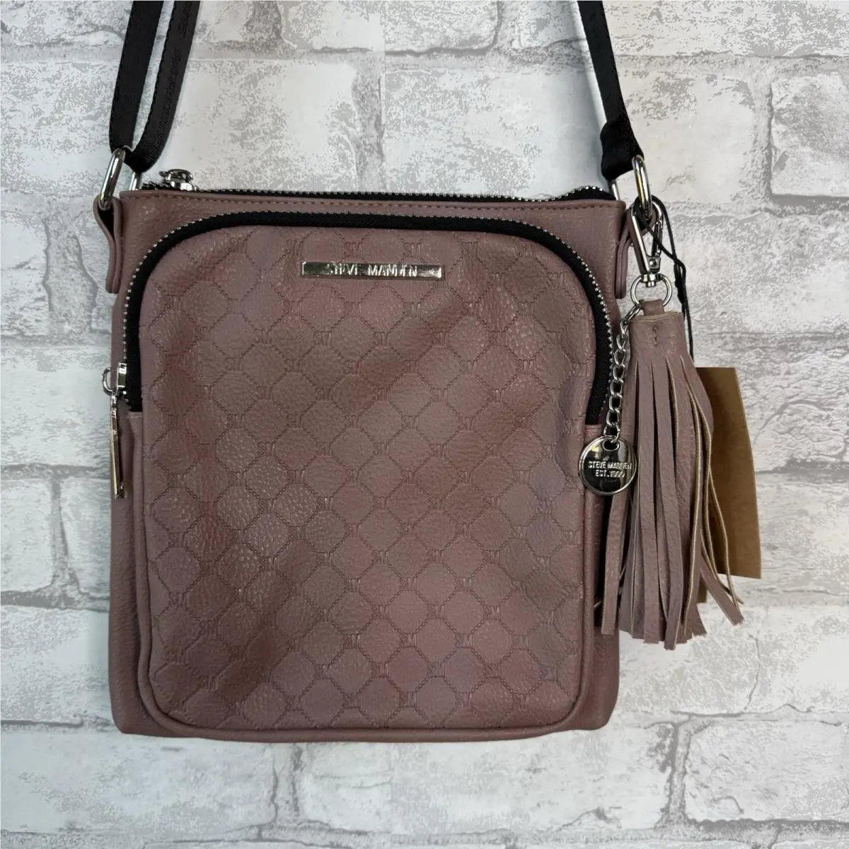 Crossbody Bag Logo Strap Tassel Zipper Pockets Charm Mauve by Steve Madden