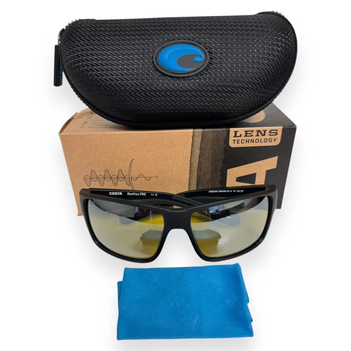 Costa Del Mar Sunglasses Reefton Pro Matte Black Sunrise Silver Glass W/case - Frame: Black, Lens: Yellow, Logo: Silver