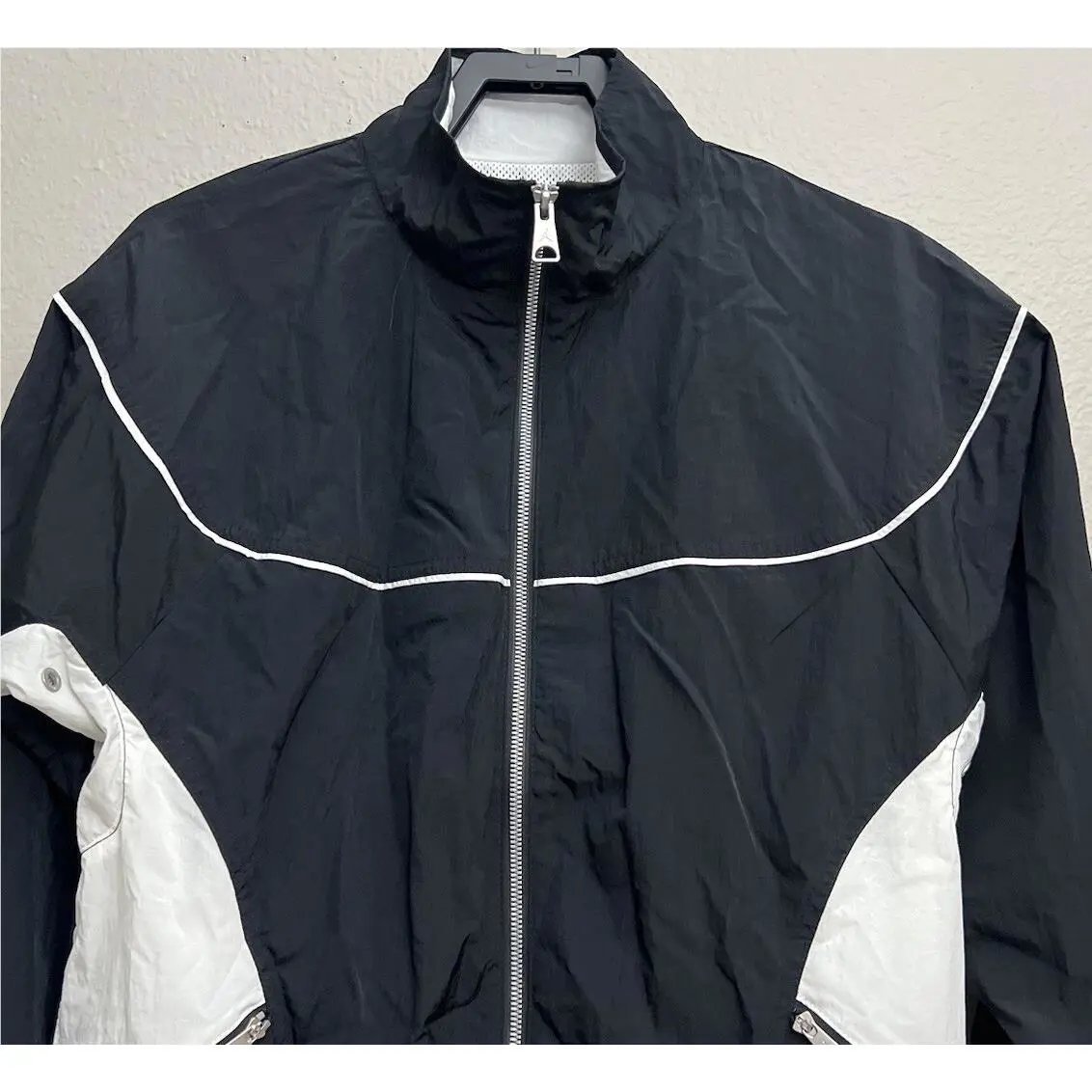 Nike clothing - Nike Air Jordan Essentials Warm Up Jacket - DV7624-010 - Black (UPC: 196155373066) 0
