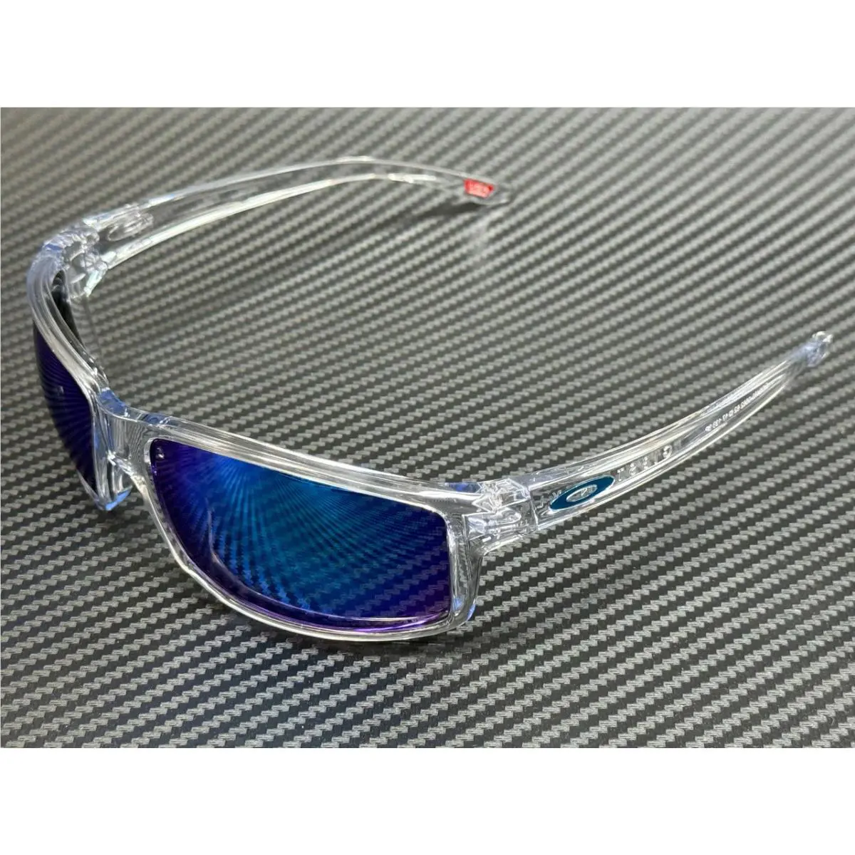 Oakley OO9470 05 Clear Prizm Sapphire Polarized Men`s 62 mm Sunglasses