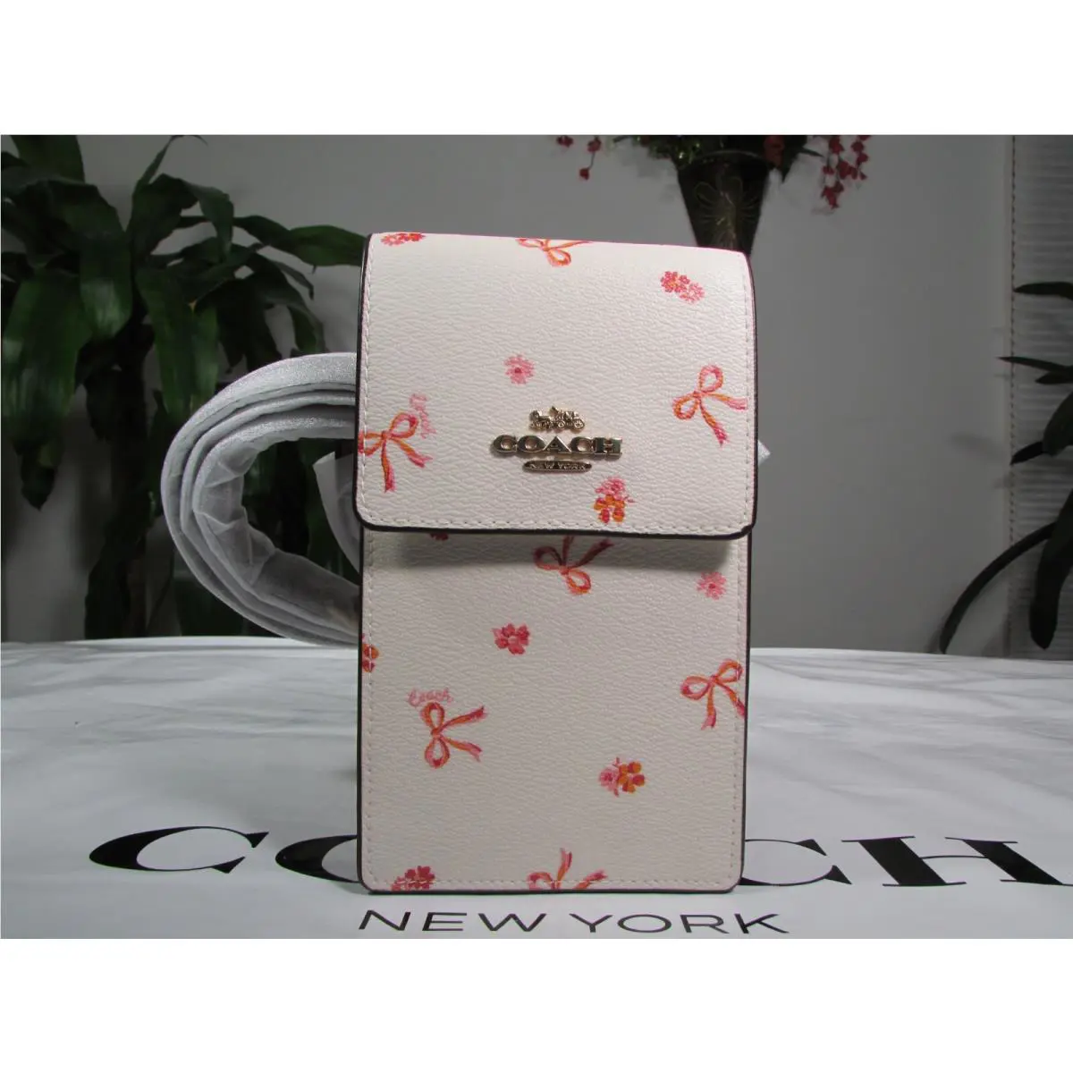 North South Phone Crossbody with Bow Print CN780 Chalk / Wine Multi by Coach