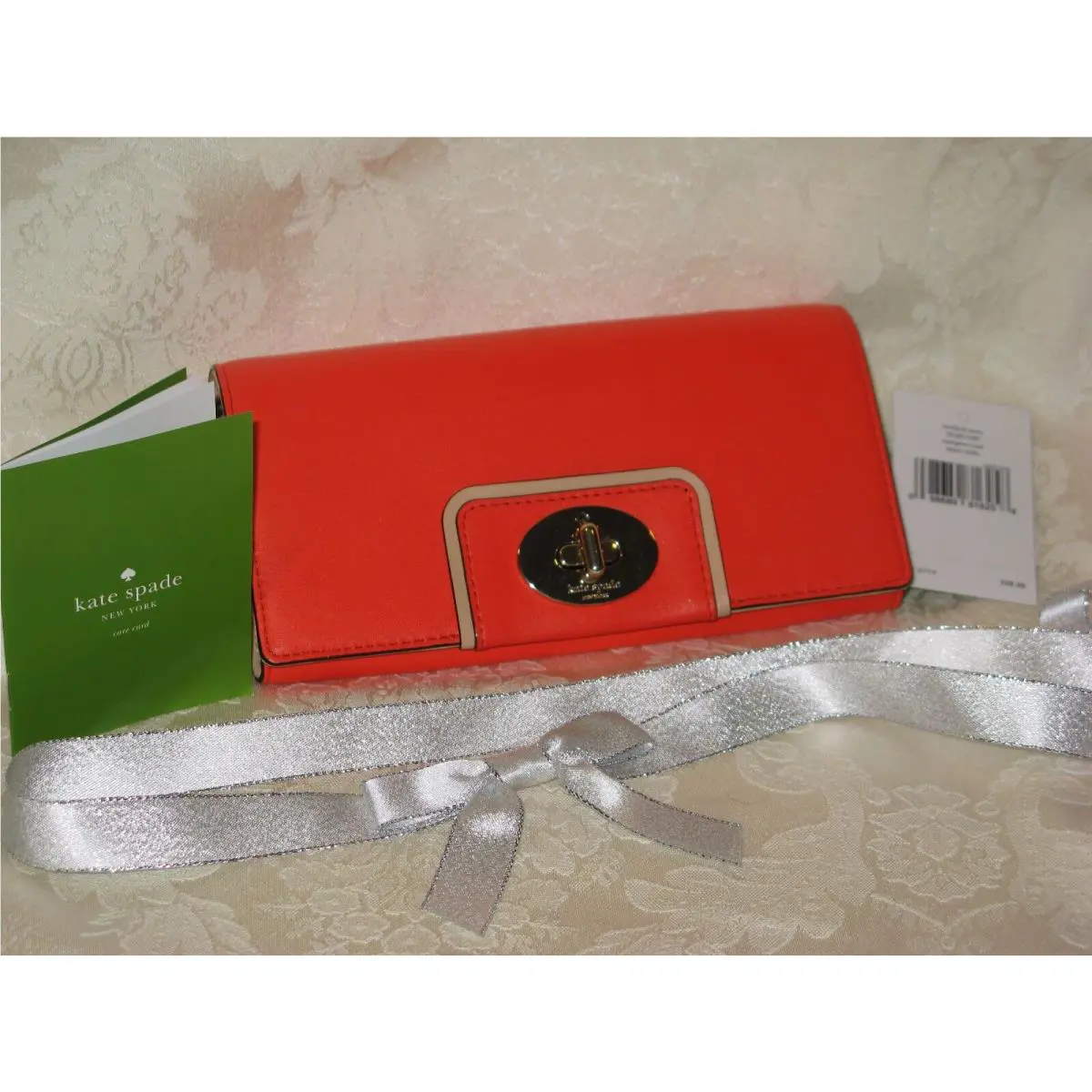 Kate Spade York Hampton Road Turnlock Mara Wallet. Flame 640