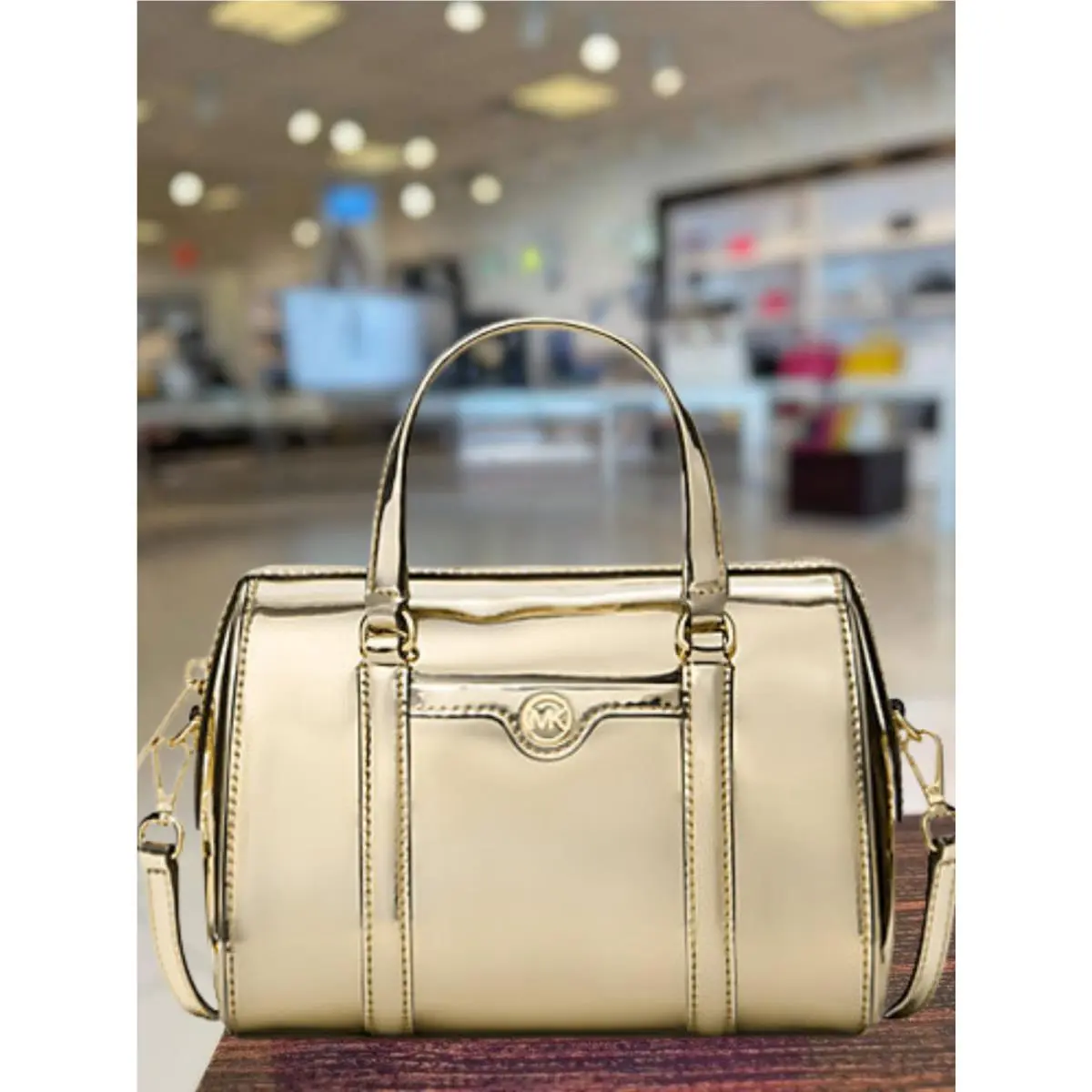 Jet Set Women Small Metallic Duffle Crossbody Purse Bag Variation PALE GOLD by Michael Kors