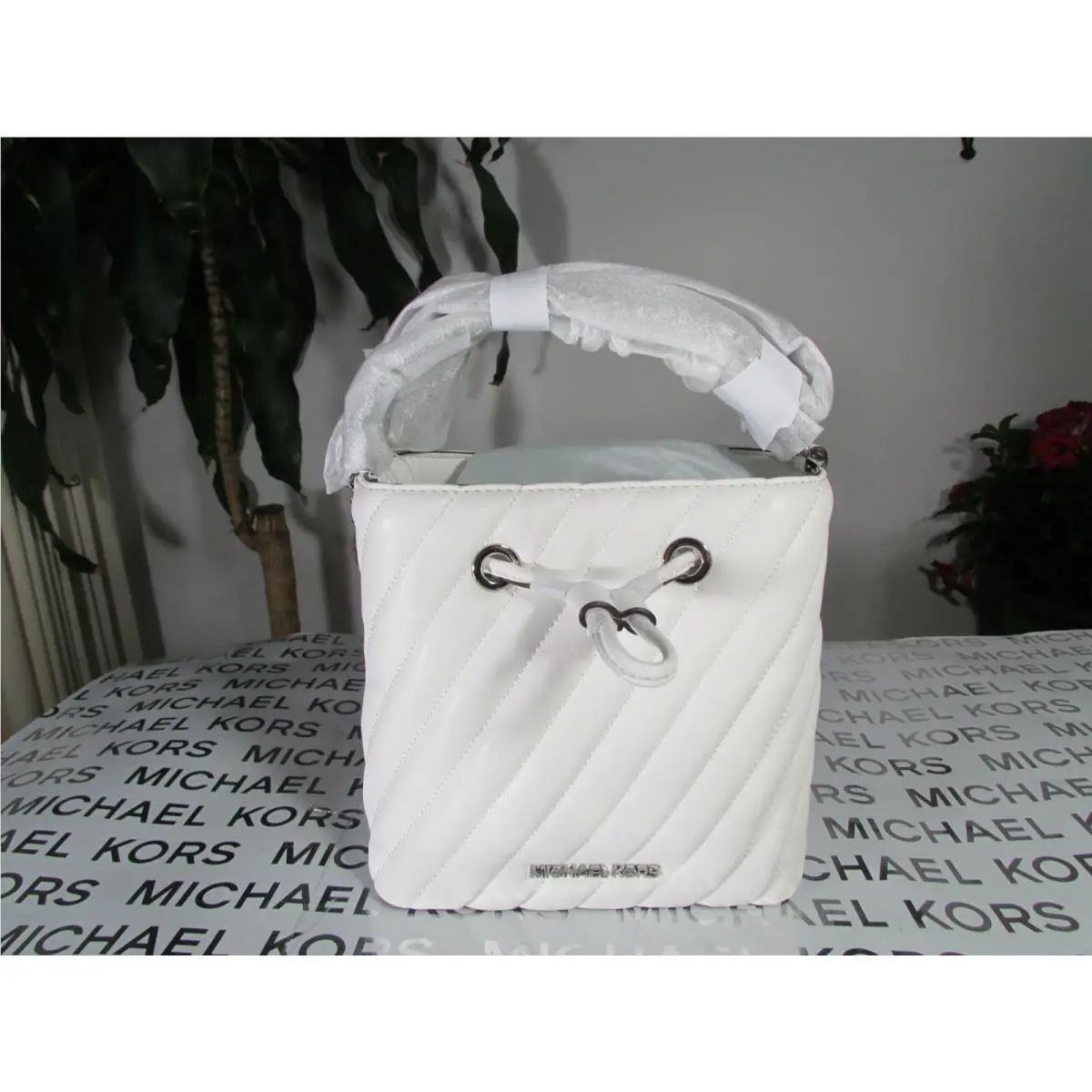 Suri Vegan Leather Small Bucket Crossbody Bag Optic White by Michael Kors