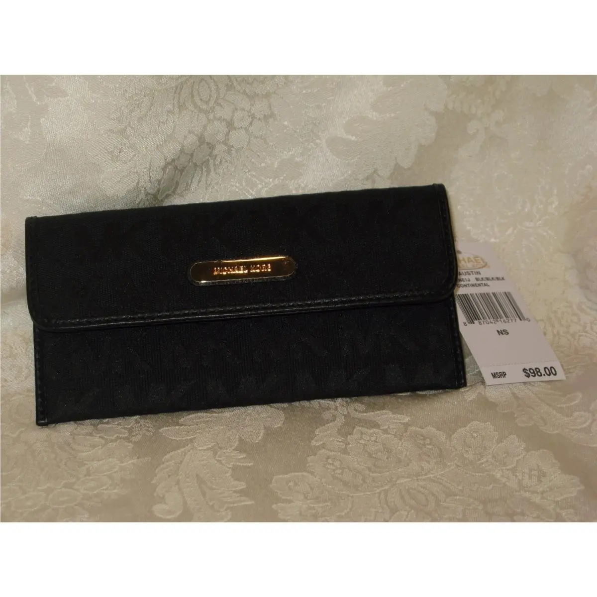 Michael Kors. Black Austin Flat Continental Signature Wallet. New