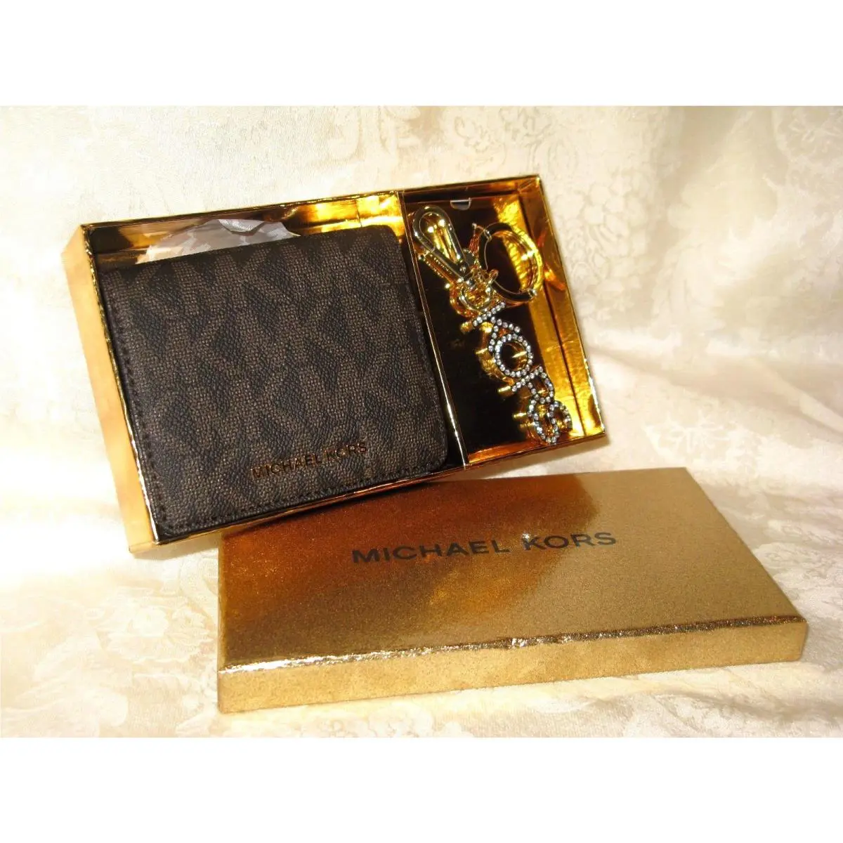 Michael Kors Women`s Brown Wallet and Keychain Set. New