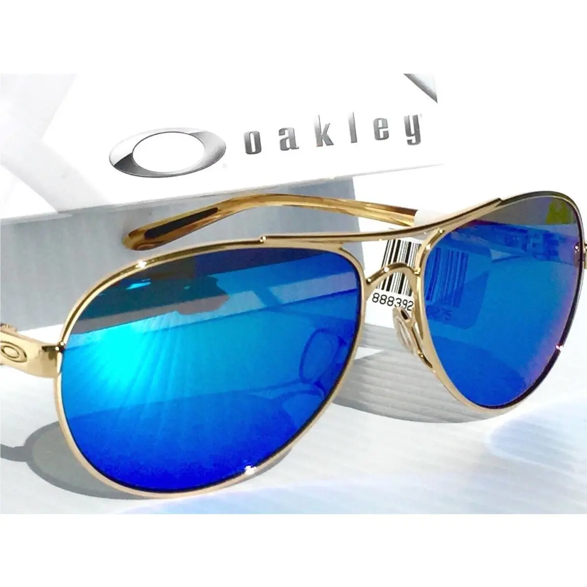Feedback Gold Aviator Polarized Galaxy Sapphire Women`s Sunglass 4079 by Oakley