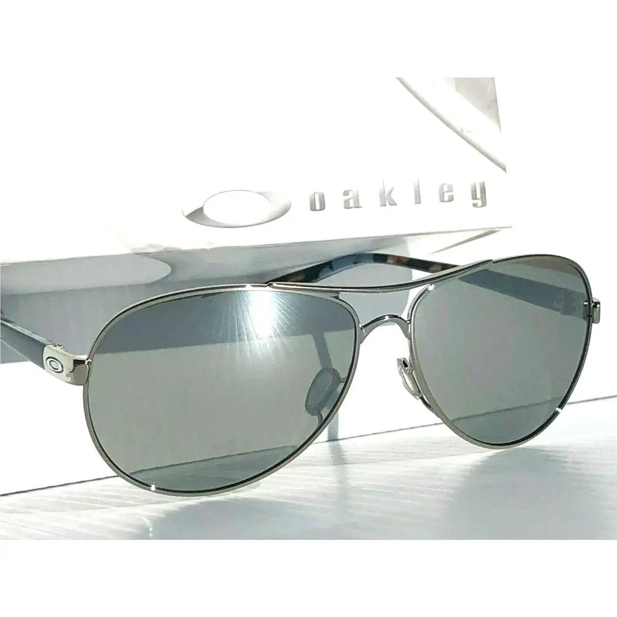 Oakley Feedback Chrome Polarized Galaxy Chrome Women`s Sunglass 4079-40
