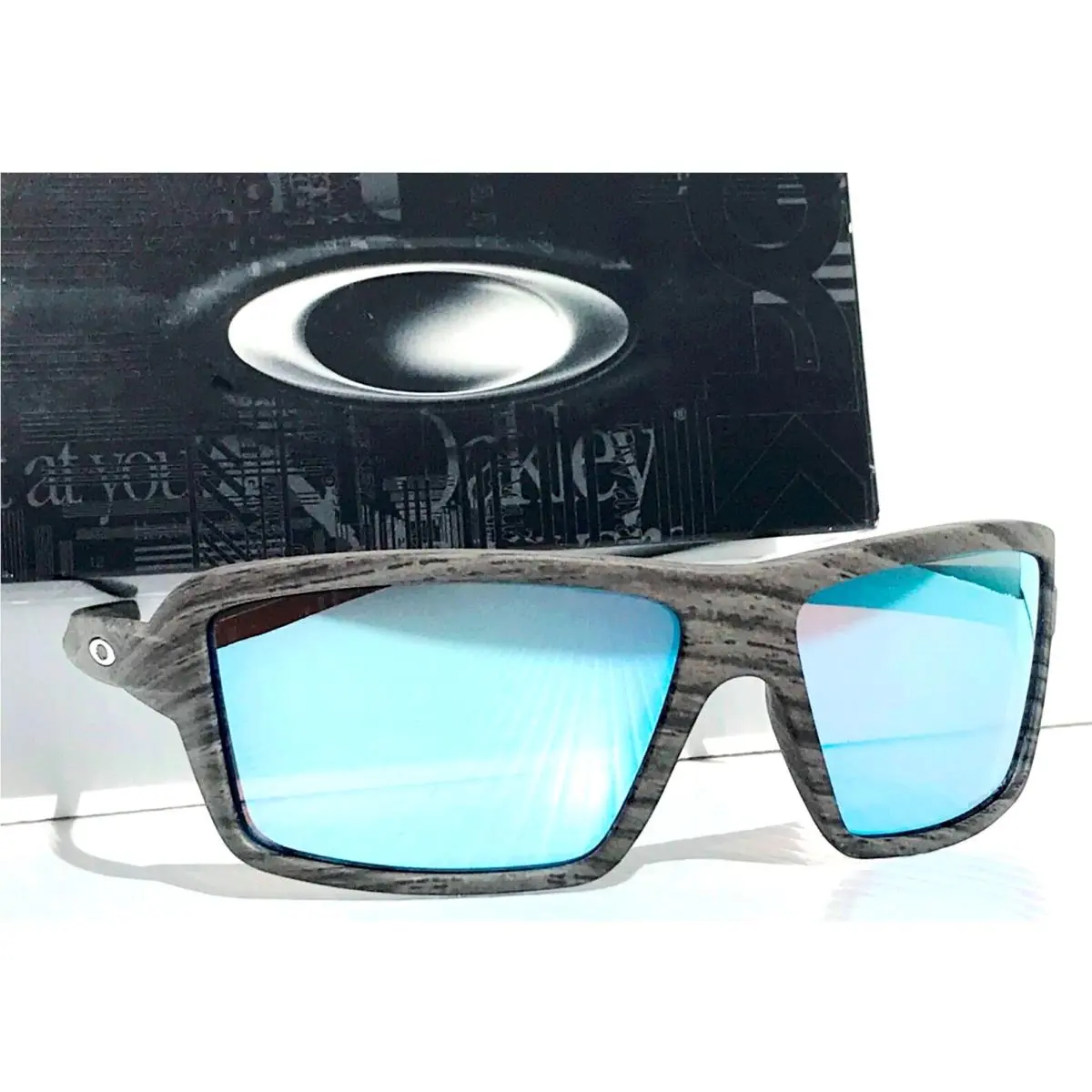 Oakley Cables Woodgrain Polarized Prizm Deep Water Lens Sunglass 9129-06 - Frame: Woodgrain, Lens: Blue