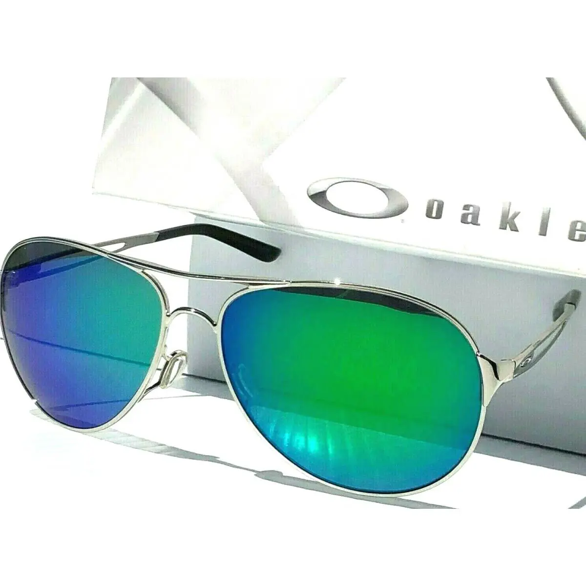 Caveat Polarized Galaxy Jade Silver Aviator Womens Sunglass 4054 by Oakley