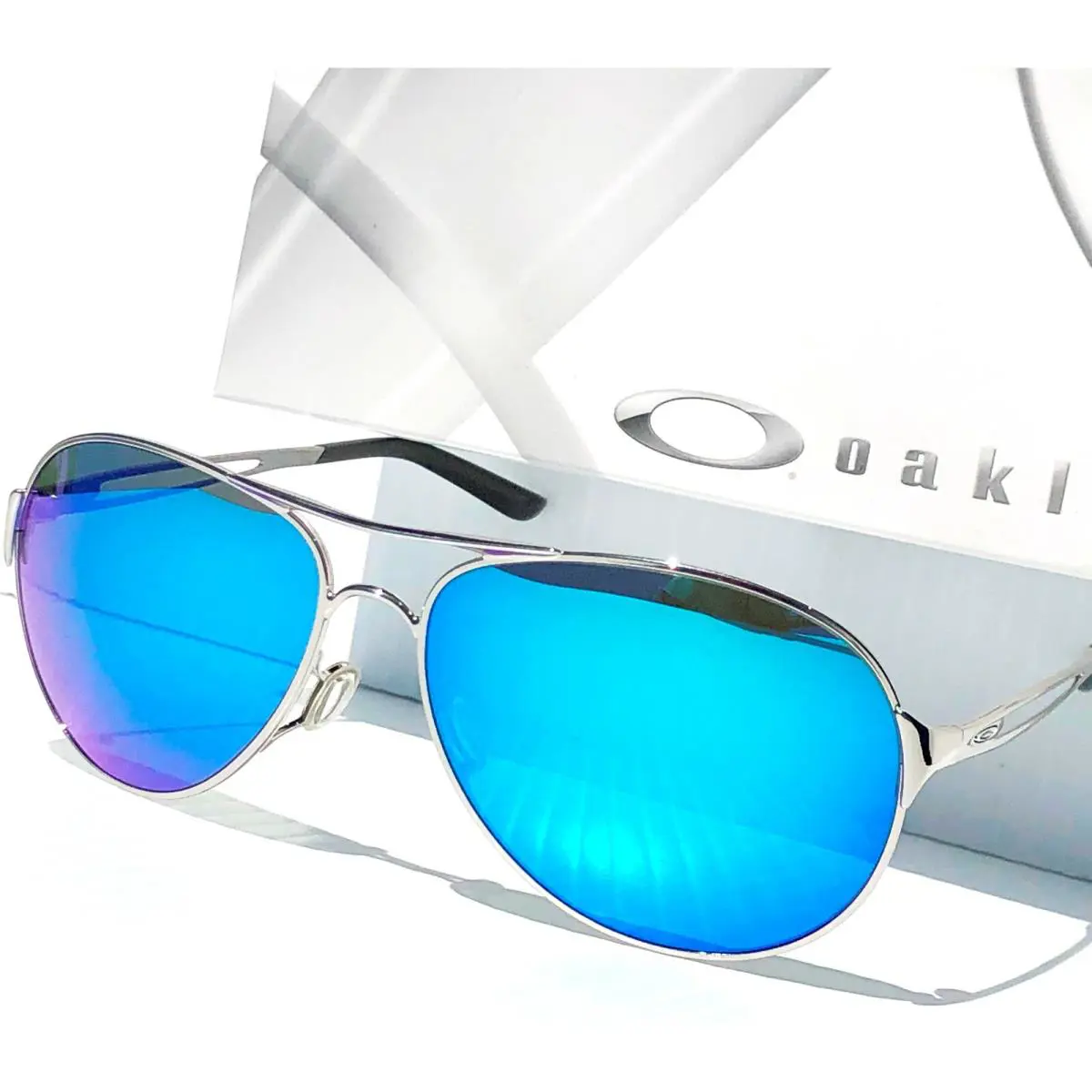 Caveat Silver Aviator w Polarized Galaxy Sapphire Sky Blue Sunglass 4054 by Oakley