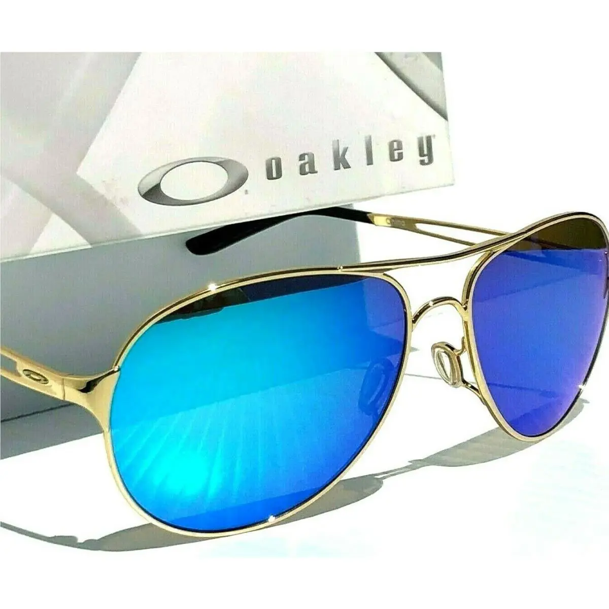 Caveat Gold Aviator Polarized Galaxy Sapphire Womens Sunglass 4054 by Oakley