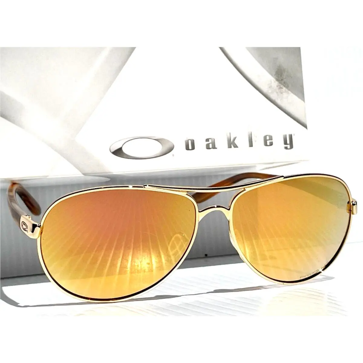Feedback Shiny Gold Polarized Prizm Rose Gold Womens Sunglass 4079-37 by Oakley