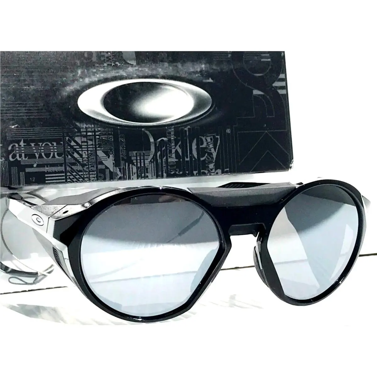Oakley Clifden Shiny Black Round Polarized Galaxy Chrome Sunglass 9440