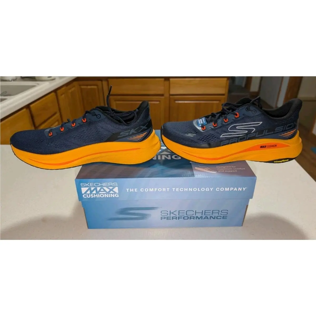 Skechers shoes - max cushioning propulsion - max cushioning propulsion - 220509 - Navy/Orange (UPC: 197976504455) 1