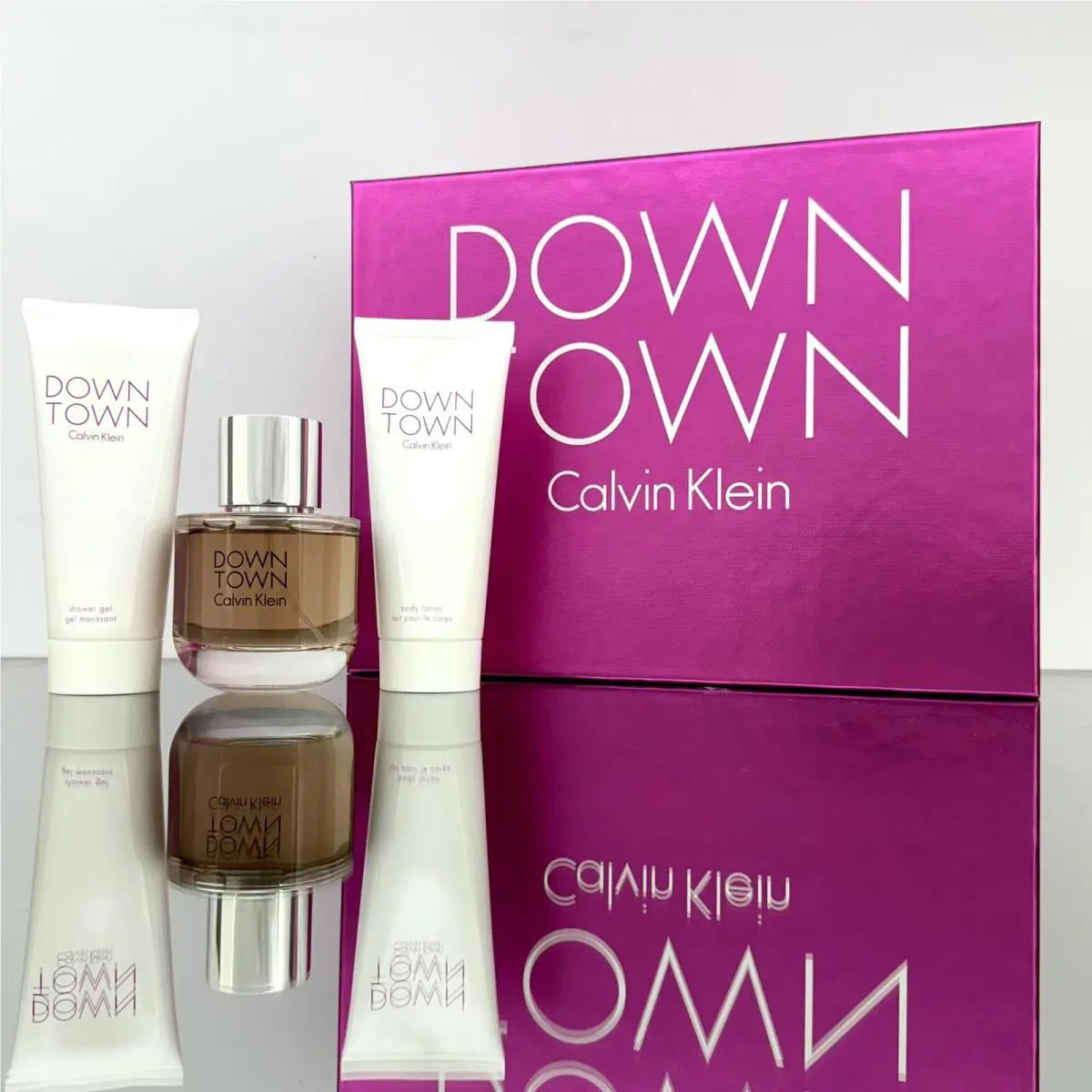 Downtown by Calvin Klein 3pc Set 3oz-90ml Edp Spr +3.4oz B/lotion +3.4 S/gel